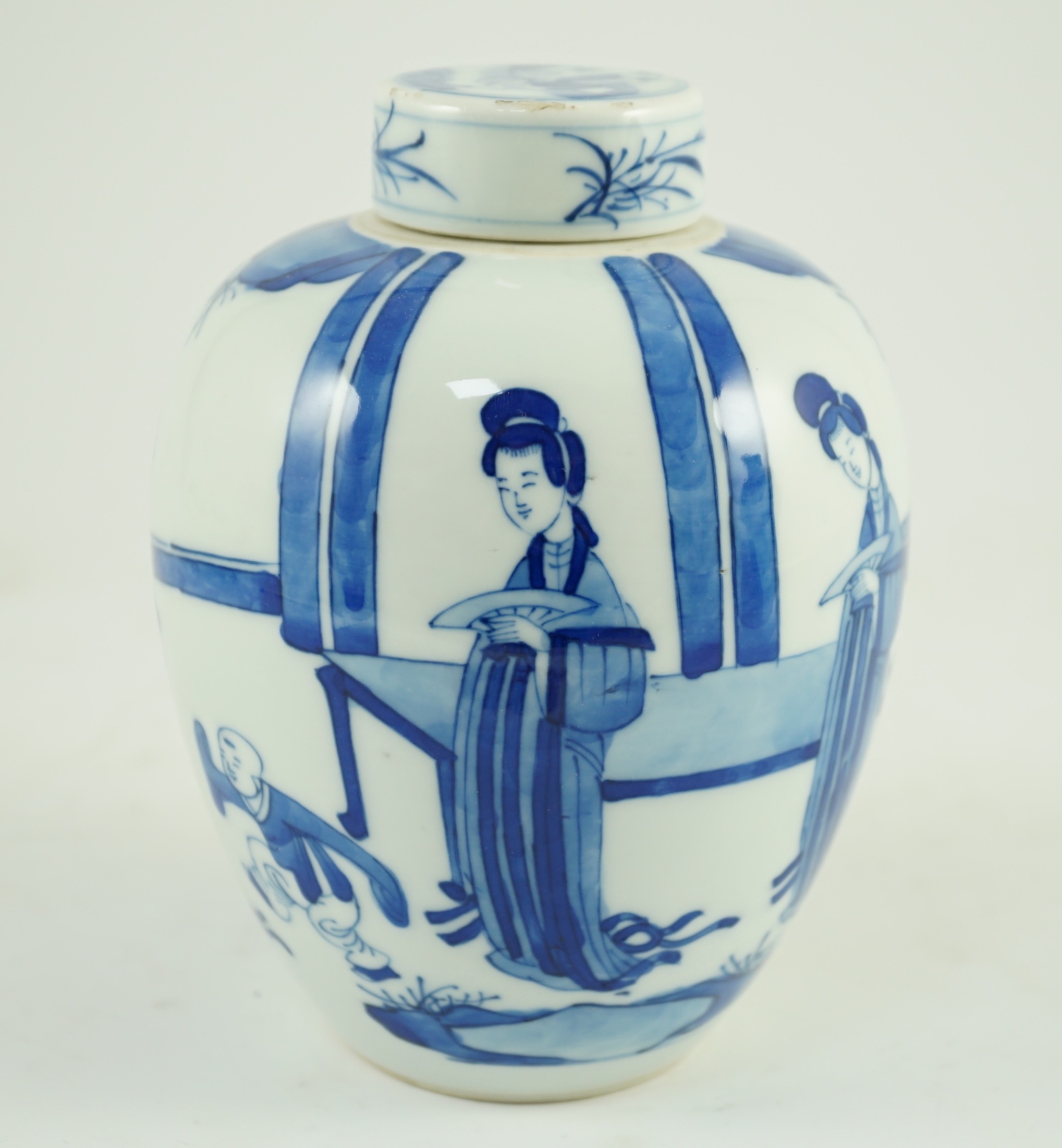 A Chinese blue and white jar and cover, probably Kangxi period, 15 cms high, 14.8cm high, small glaze losses to cover